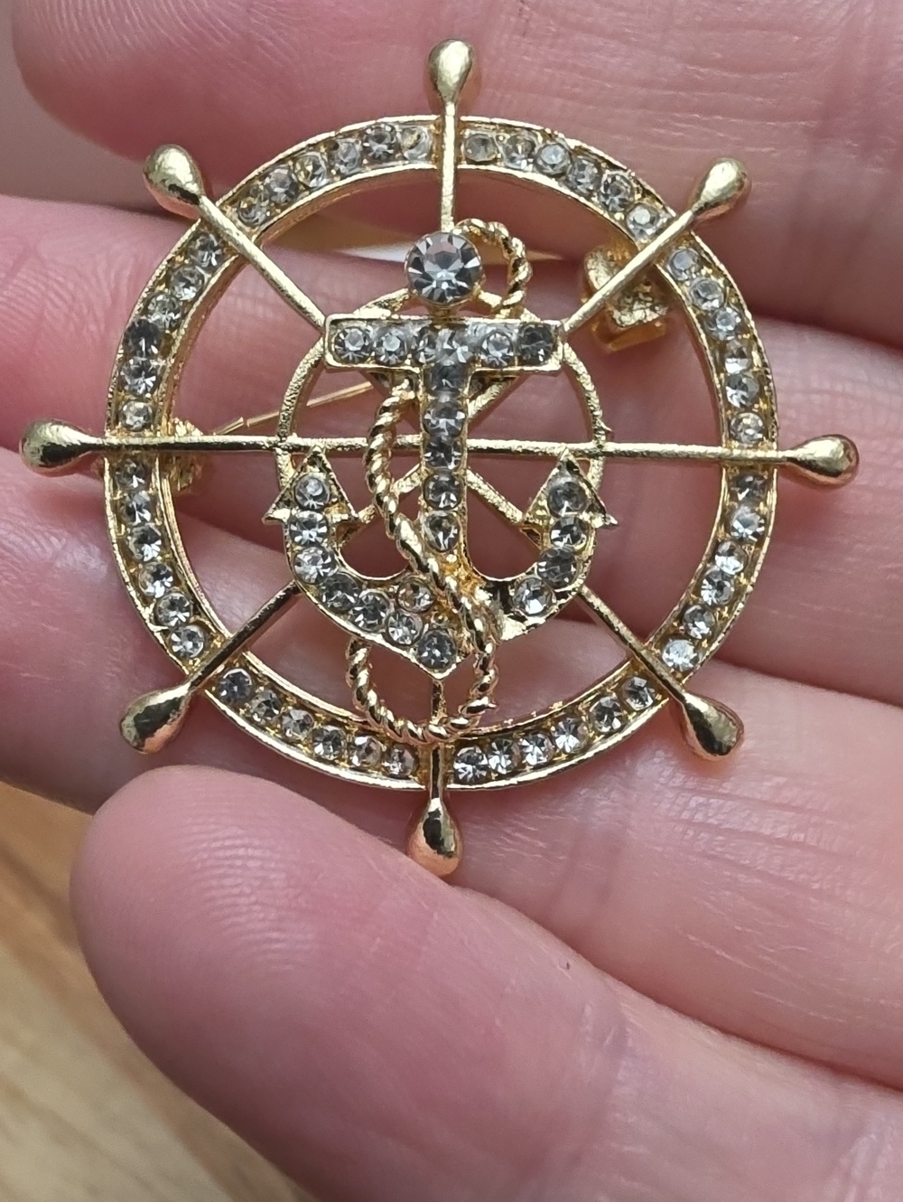 A104- Gold-Tone Nautical Anchor & Wheel Brooch with Clear Crystals